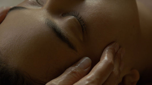 Woman having lymphatic facial 