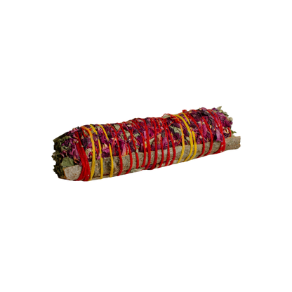 Rolled Havan sage bundle with colorful ribbons on a white background