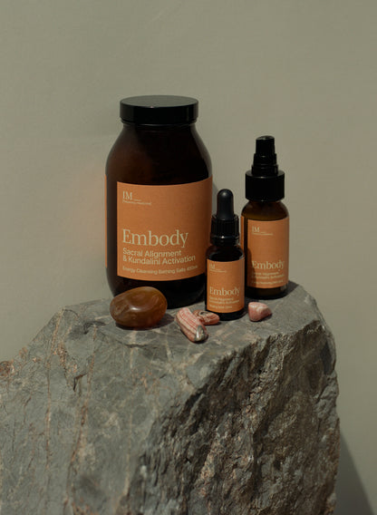 IM Frequency Medicine Embody Chakra healing family Sacral baths salts, crystals, energy spray bottles with crystals on a stone