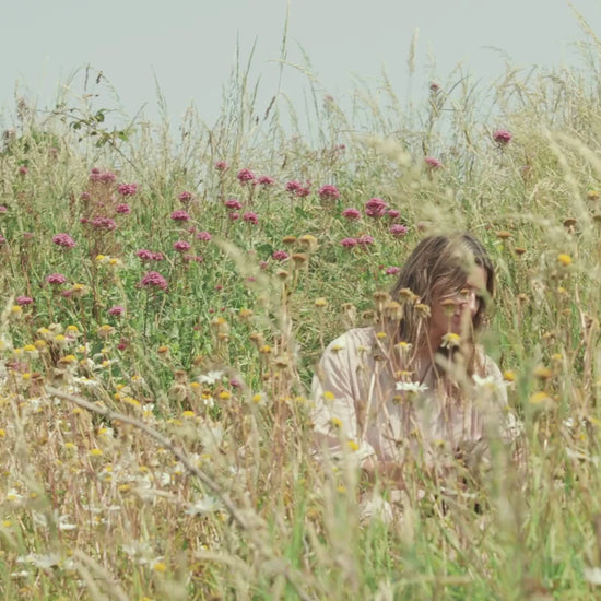 Video of facial in spring meadow 